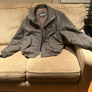 This awful warm winter jacket was hardly used.Made of 100% wool.